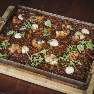 Arròs sec de ceps i peus de porc